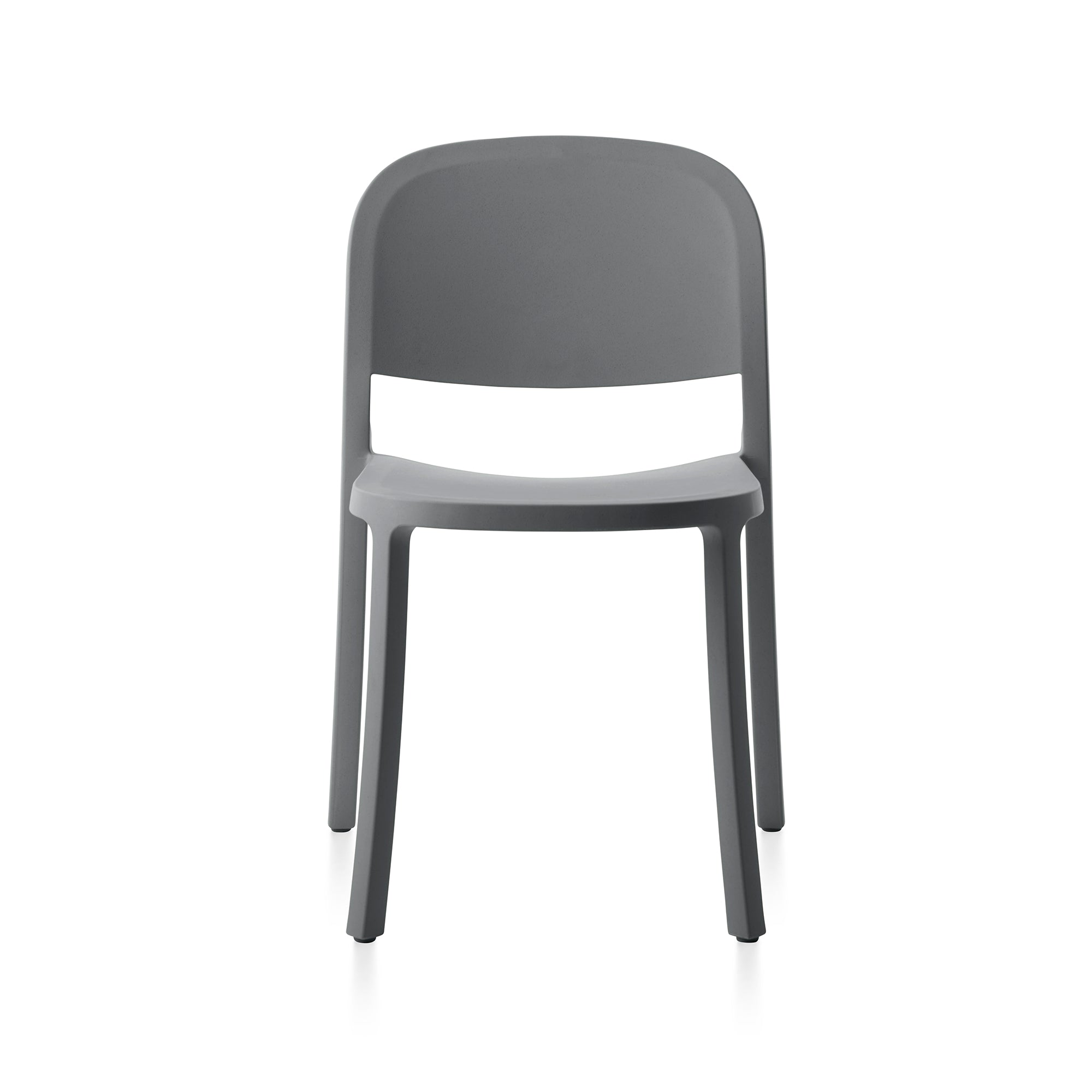 A recycled plastic Reclaimed Chair by Emeco, in light grey, front view.