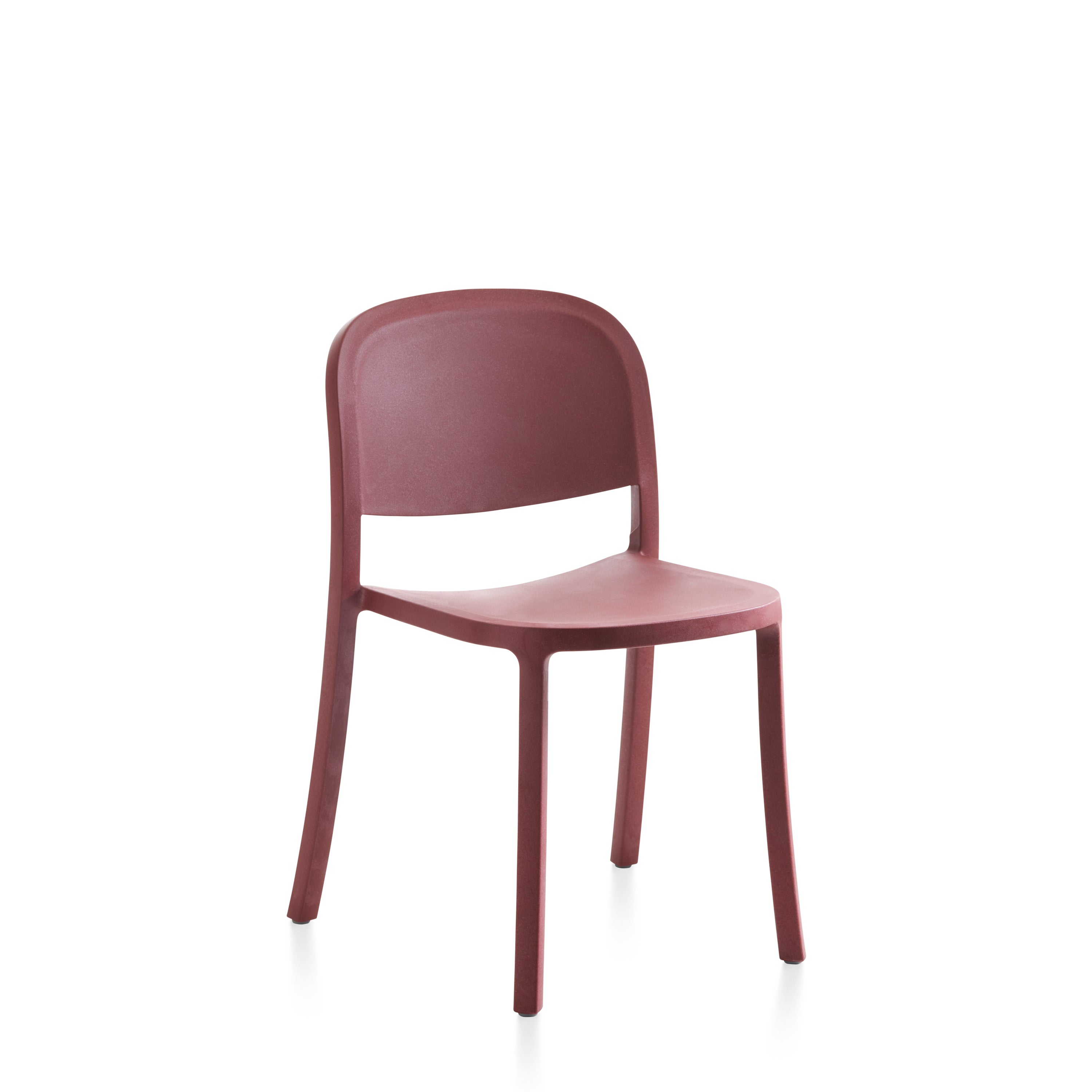 A recycled plastic Reclaimed Chair by Emeco, in red.