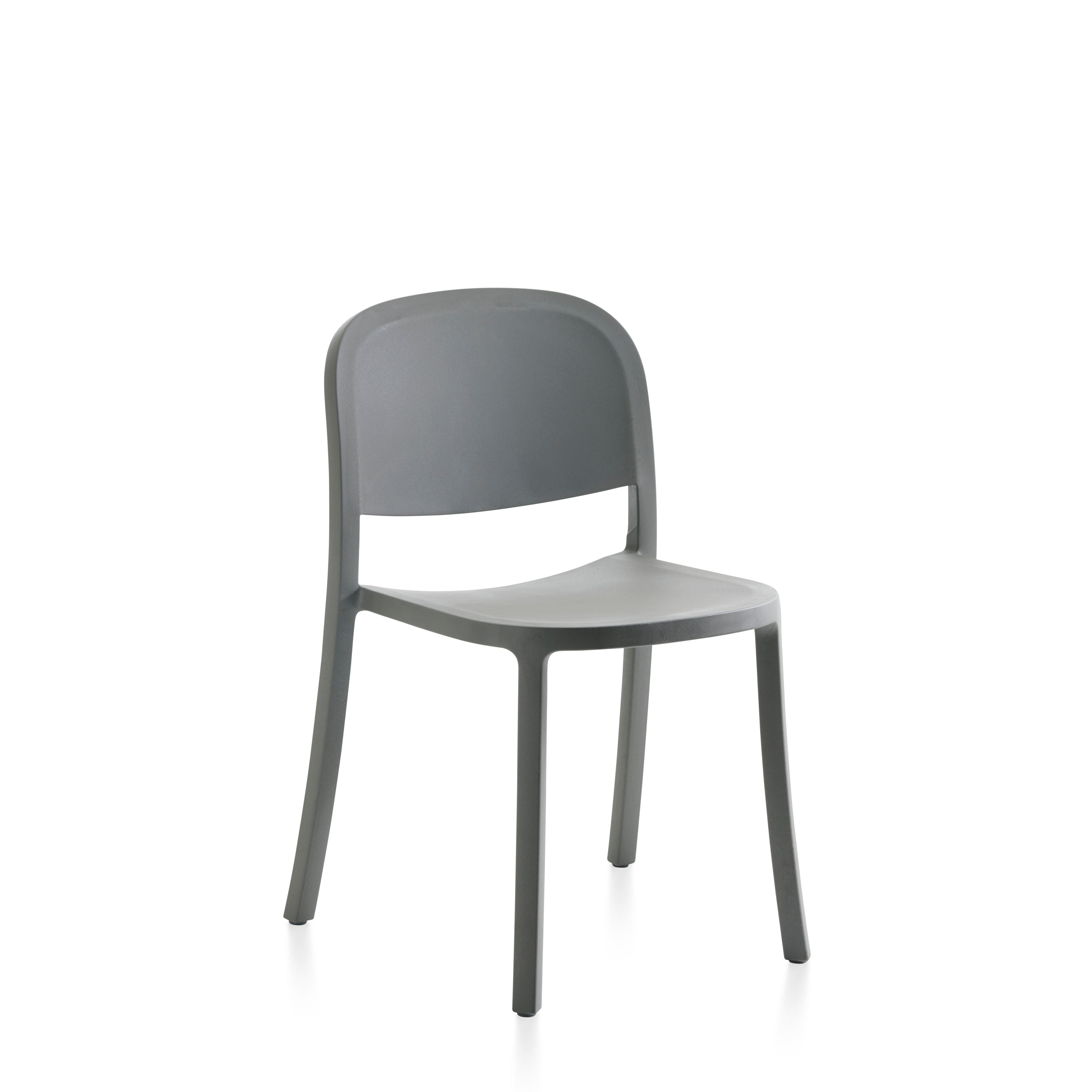 A recycled plastic Reclaimed Chair by Emeco, in light grey.